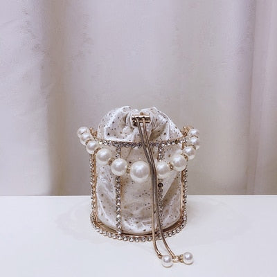 Hollow Out Pearl Bucket Evening Bag Women 2019 Luxury Designer Korean Handmade Alloy Metallic Clutch Bag Ladies Shoulder Bags